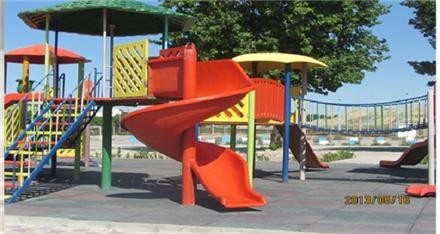 Golden fiberglass park slides