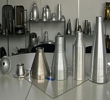 Manufacture of titanium, steel and aluminum parts by rotational forming or spinning of cnc metals