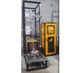 Induction furnace for industrial hardening of shafts and gears